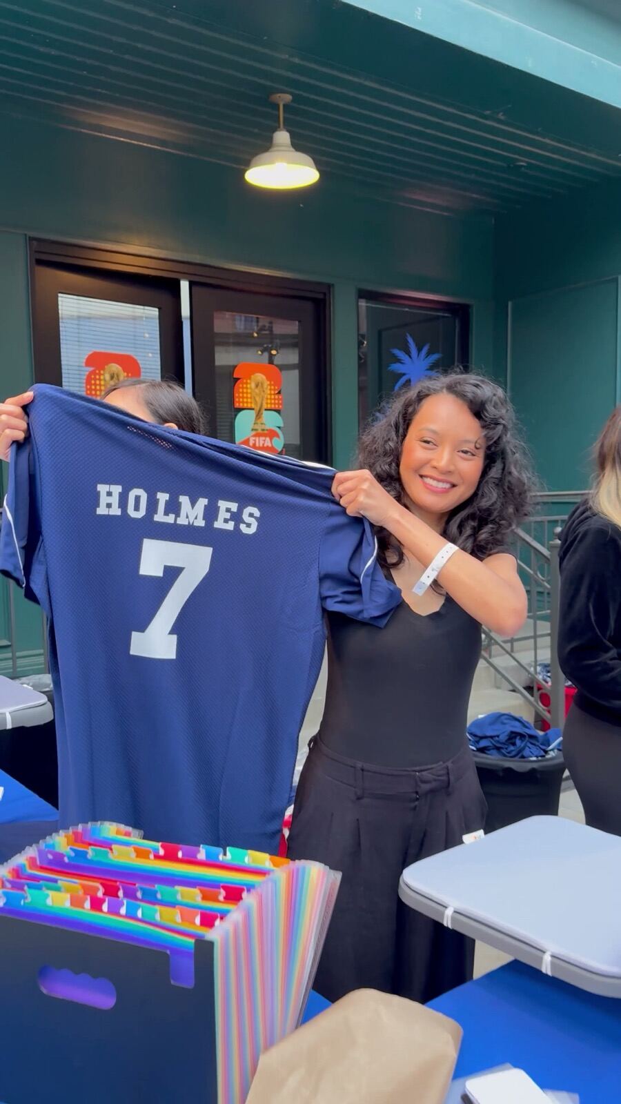 Guest holding customized merch after a live event activation